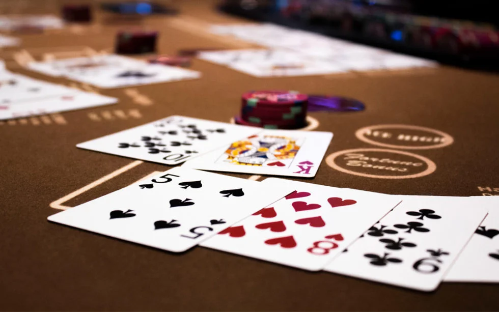 Cards in play at a gaming table